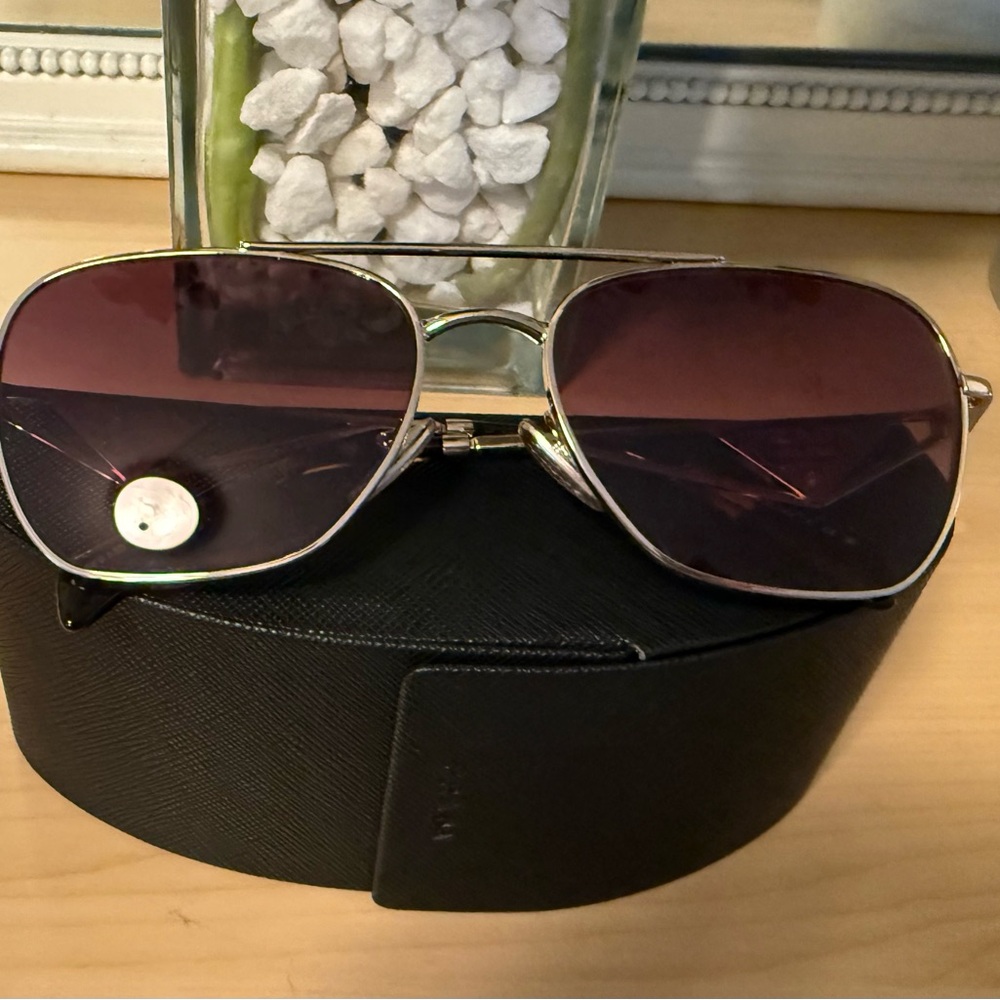 Celebrity-Owned Prada Sunglasses - Picture 1 of 6